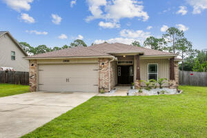 No HOA! Wonderful floor plan with 2167sqft, 4 Bedrooms, privacy fenced, large .46 of an acre yard, open concept split floor plan, plenty of cabinet space, oversized laundry room, whirlpool stainless steel appliances & located right off Navarre Parkway