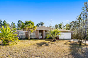 Opportunity Knocks! Holley by the Sea 4 bedroom, 3 bath plus office all brick home.