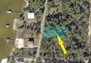 Gulf Breeze lot, commercial lot Located just East of the Gulf Breeze Zoo